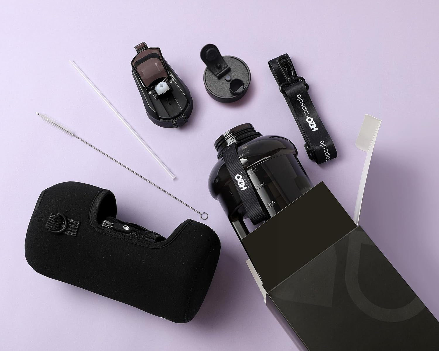 2.2L Half Gallon Water Bottle with Storage Sleeve and Covered Straw Lid – BPA Free Large Reusable Drink Container with Handle - Big Sports Jug, 2.2 Liter (74 Ounce)